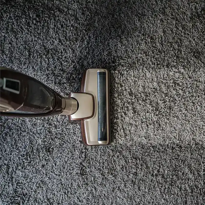 vacuuming carpet 