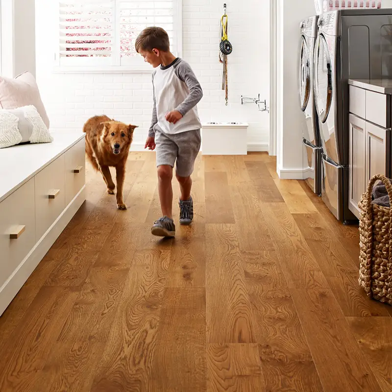 child and boy running on pet-friendly and kid-friendly flooring