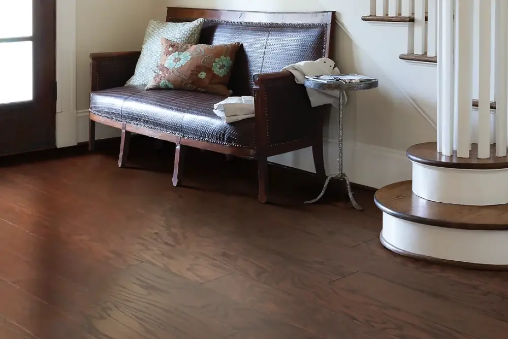 dark colored oak flooring in a high-traffic entryway 