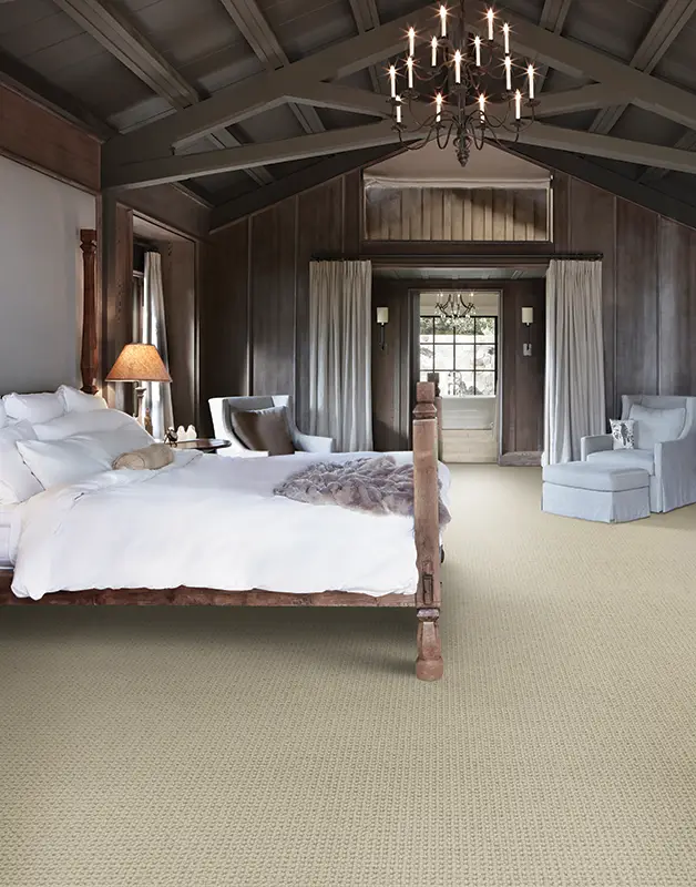 neutral carpet in luxurious master bedroom 