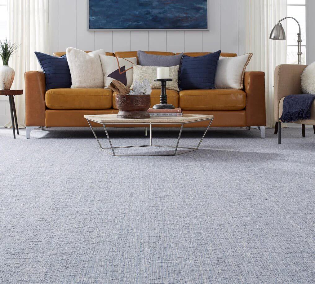 living area with wool carpet